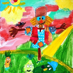 Веселое пугало охраняет веселый урожай.