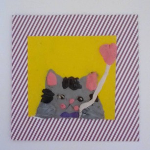 Кошечка в окошечке