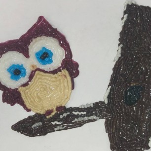 Сова в снежном лесу