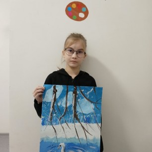 Лебедь на зимнем пруду.