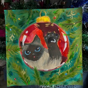 "Сиамский котенок в рождественском шаре"