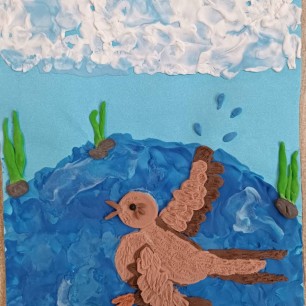 Воробушек в лужице