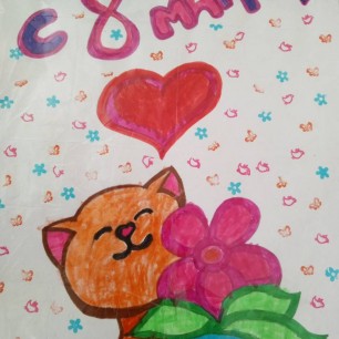 Котик с цветком