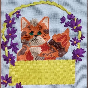 Котенок в корзине