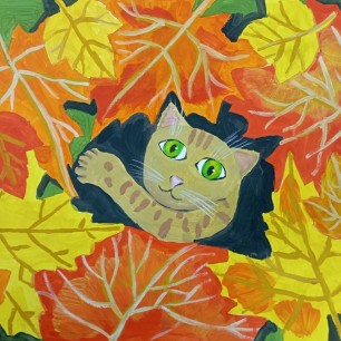 Котенок в листьях