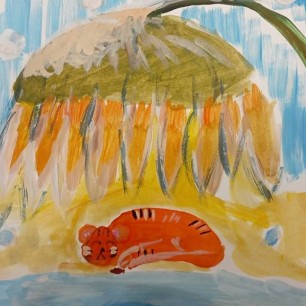 Уссурийский тигр зимой под подсолнухом.