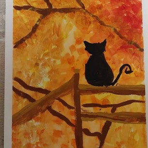 Кошка осенью