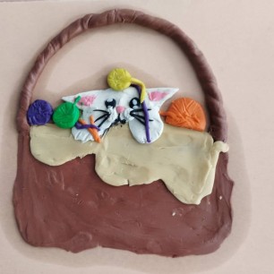 Котёнок в корзинке