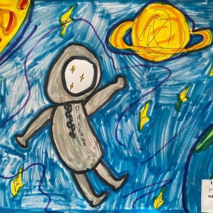 Космонавт изучает планеты.