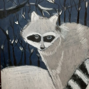 Енот в зимнем лесу