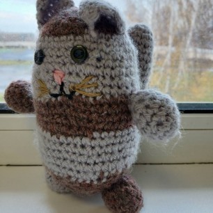 Серый кот.