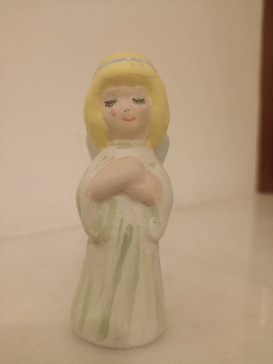 Умиляющийся ангел
