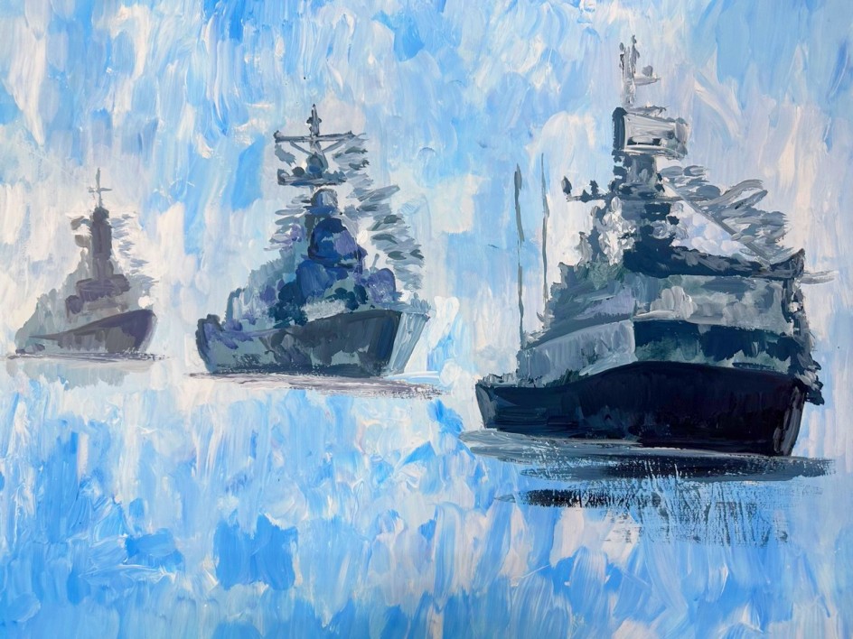 В море