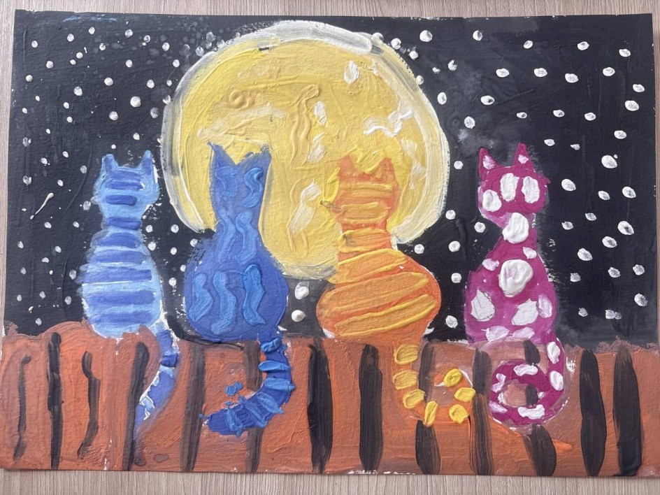 Кошки смотрят на луну