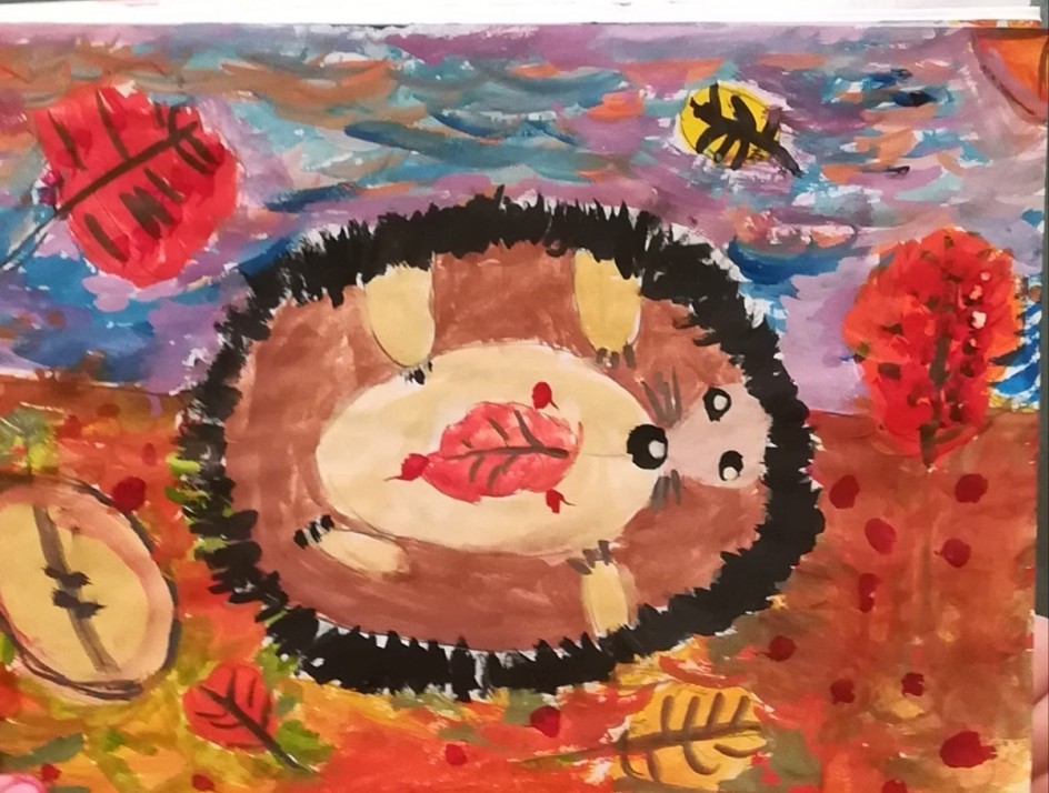 Ёжик с листочком на животе