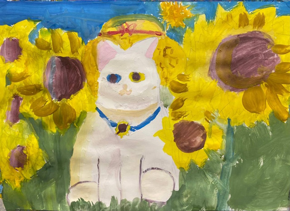 Кот в подсолнухах