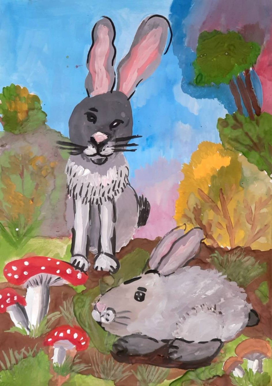 Зайцы в осеннем лесу.