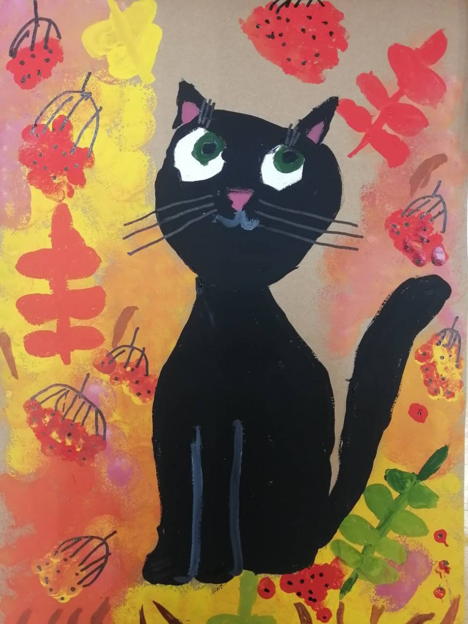 "Черный кот в осенних листьях"