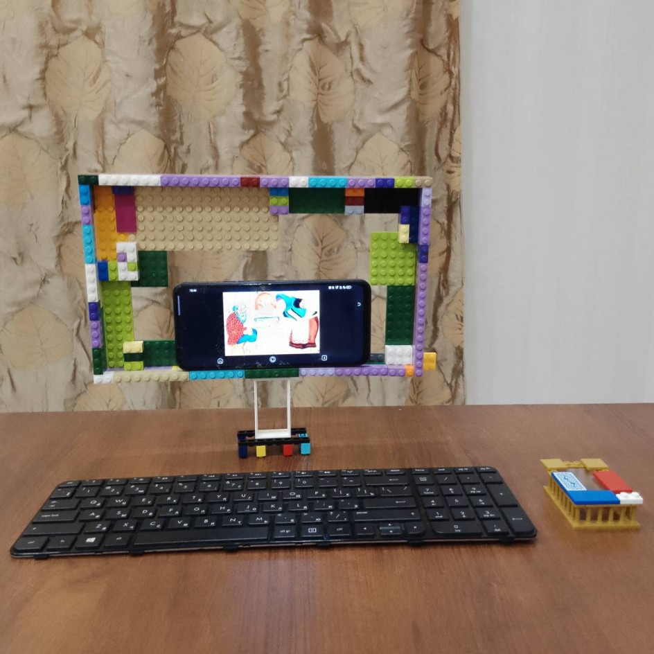 Компьютерная установка для просмотра видео на планшете, телефоне