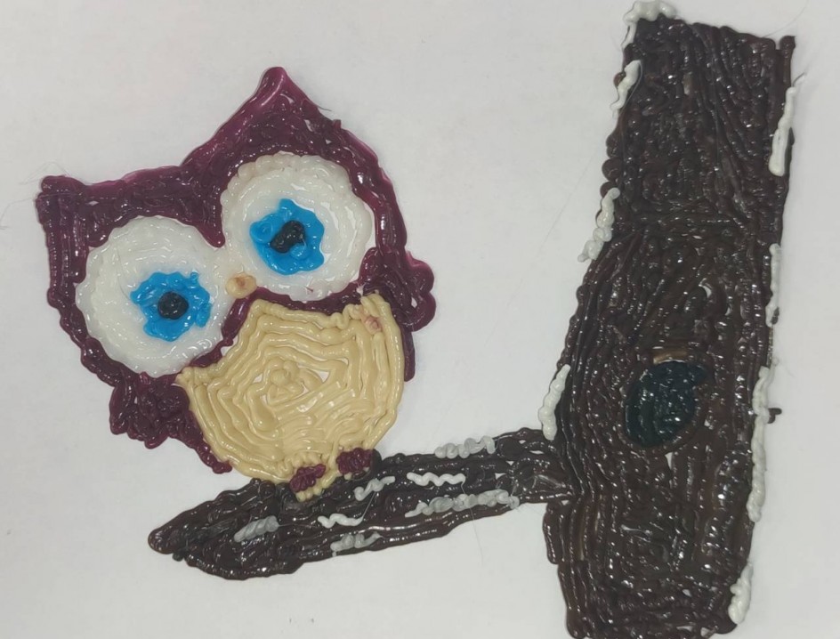 Сова в снежном лесу