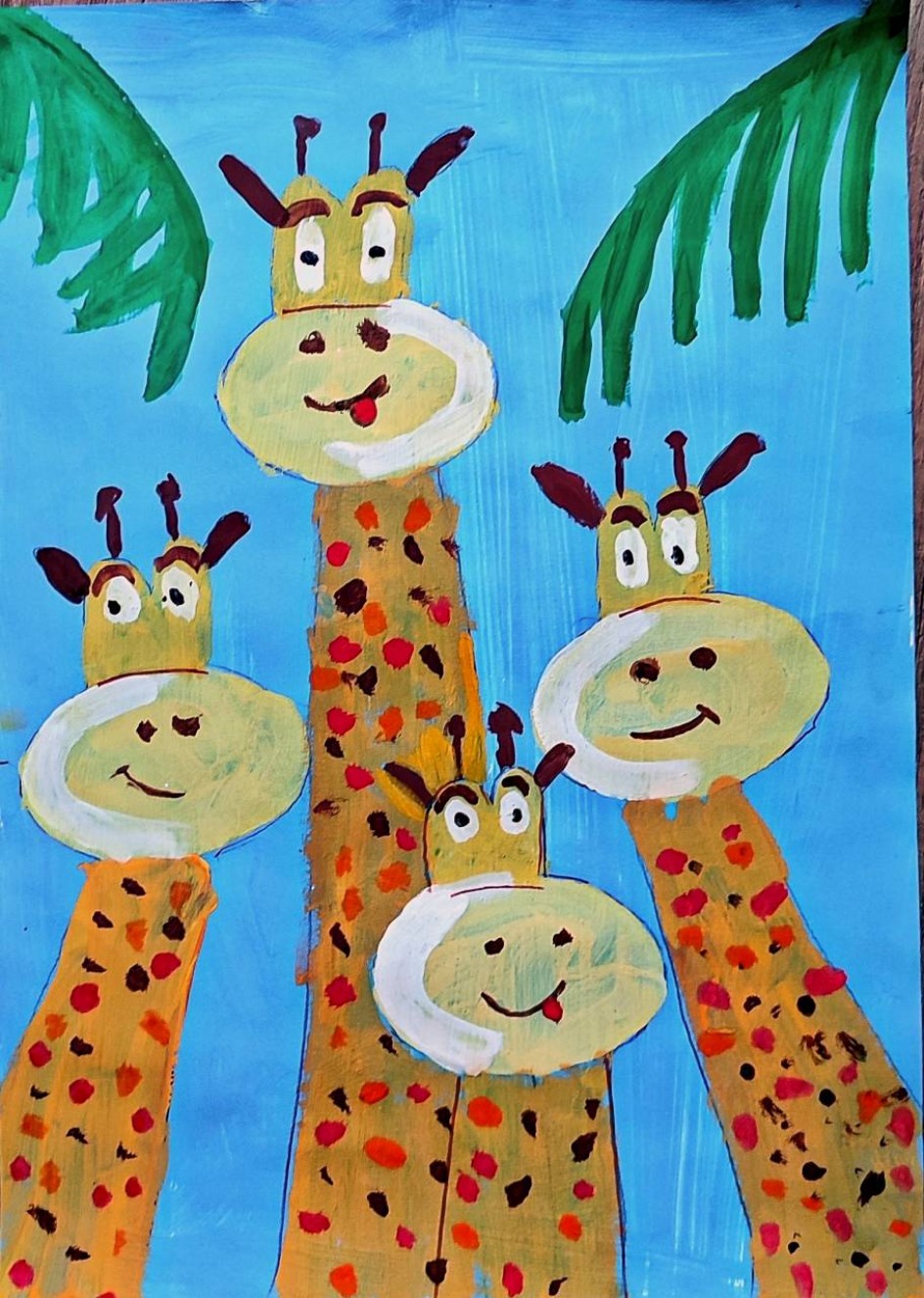 Милая семейка жирафов в Африке.