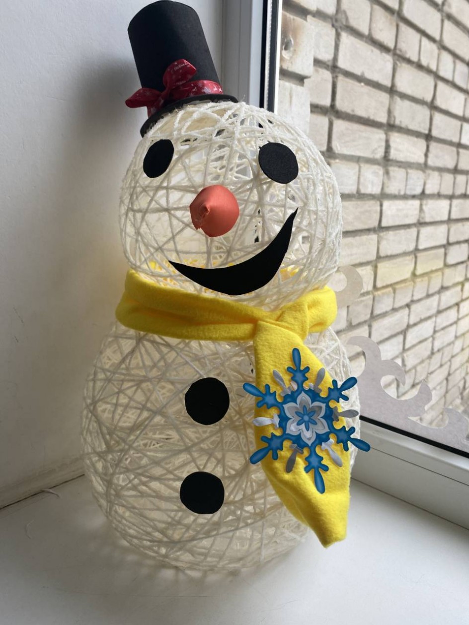 Веселый снеговик