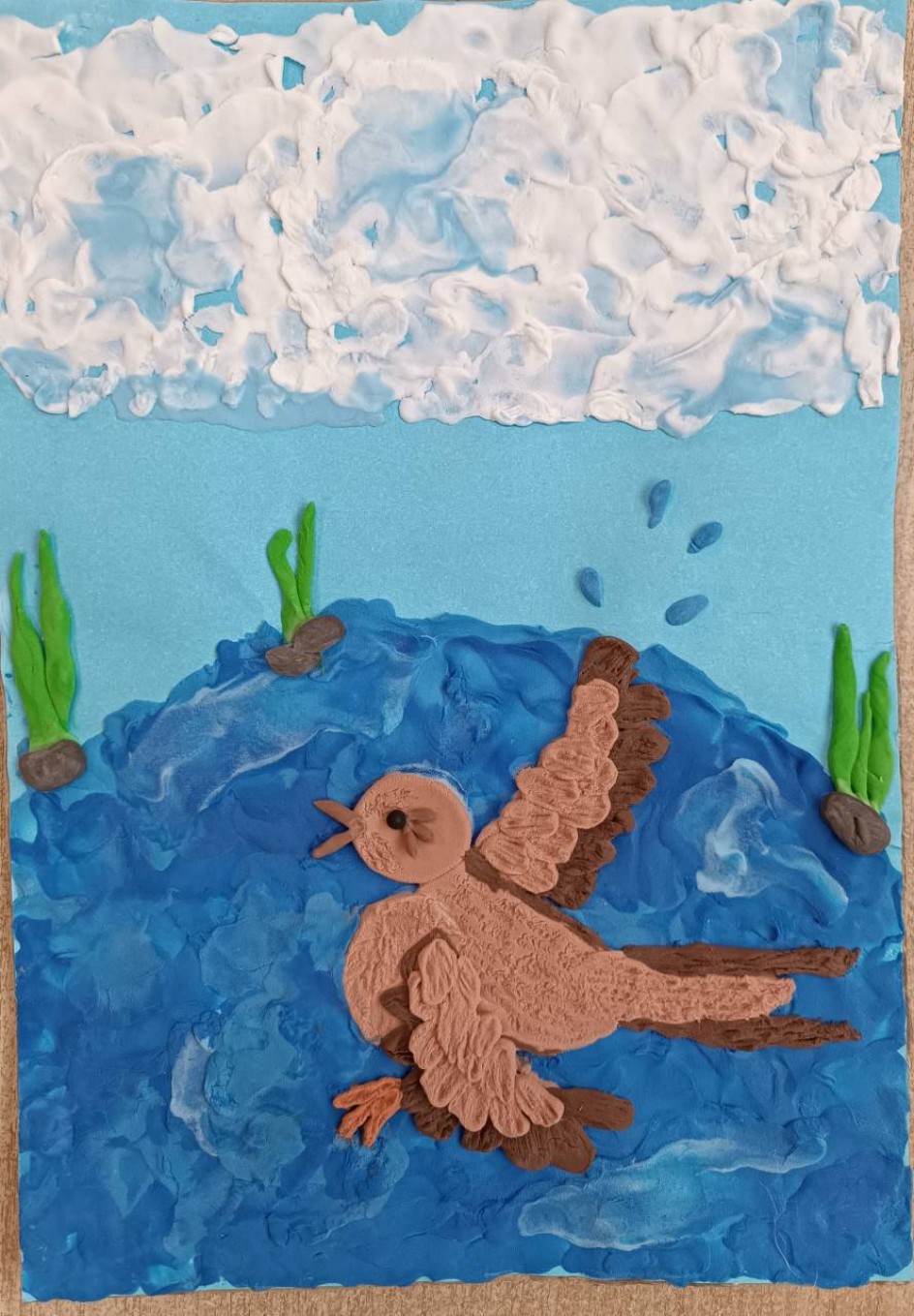 Воробушек в лужице