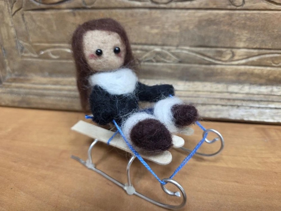 Девочка на санках