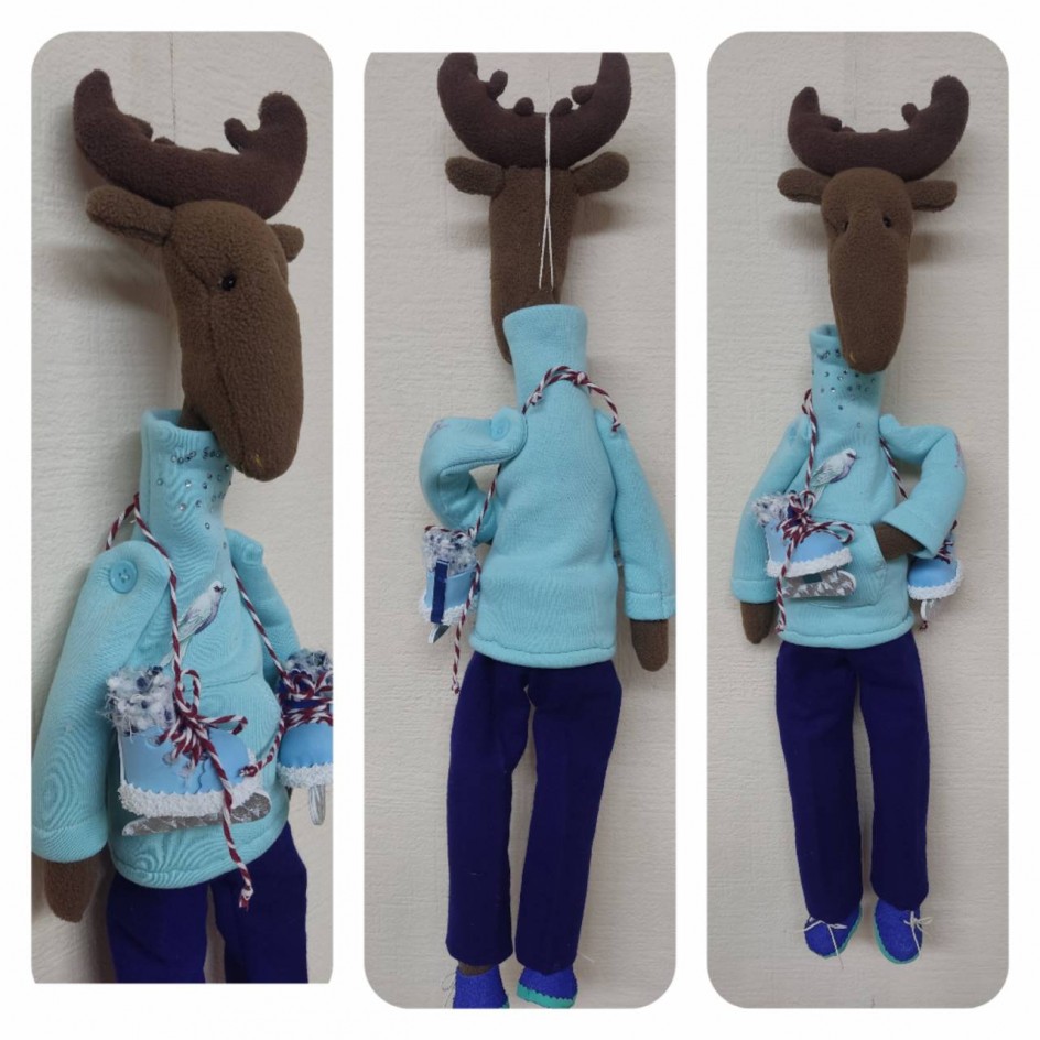 Олень с коньками.