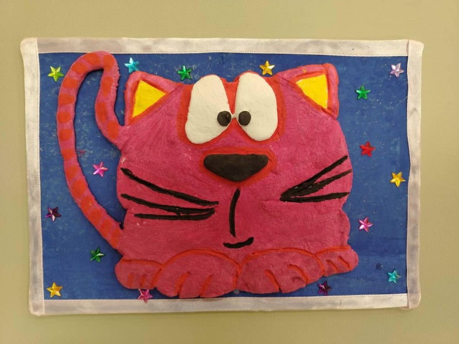 Розовый кот