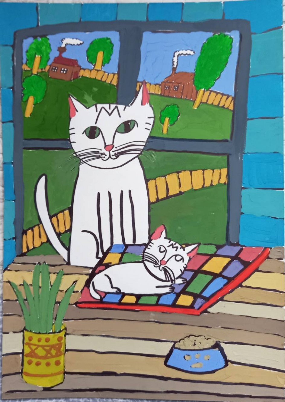 Кошки на окошке