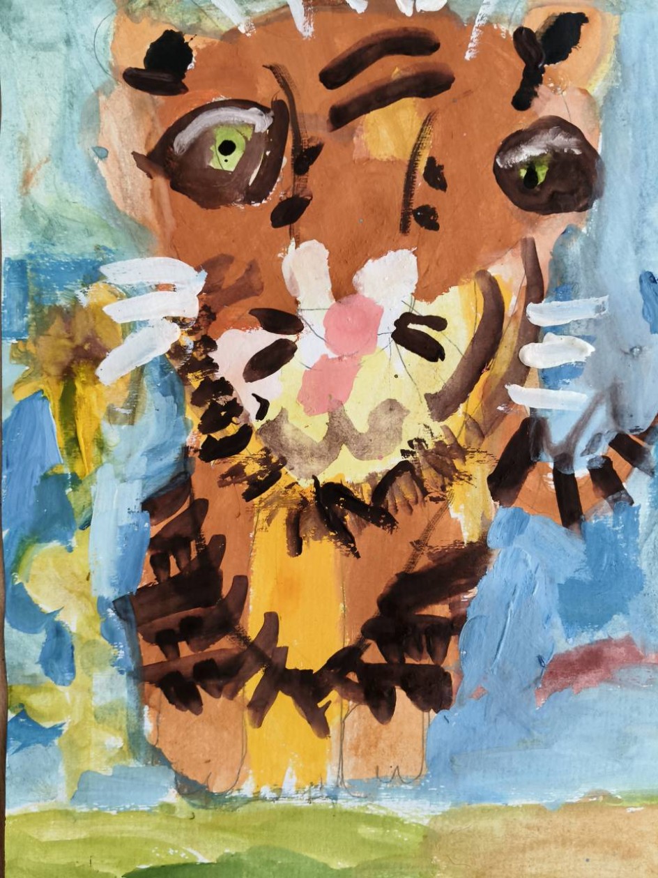 Тигренок на подсолнухе