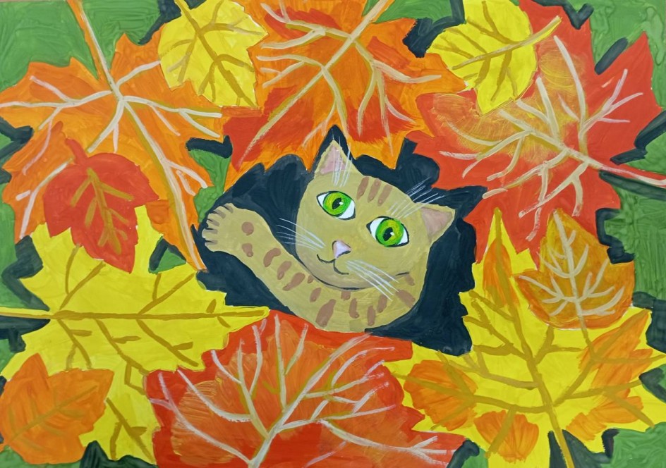 Котенок в листьях