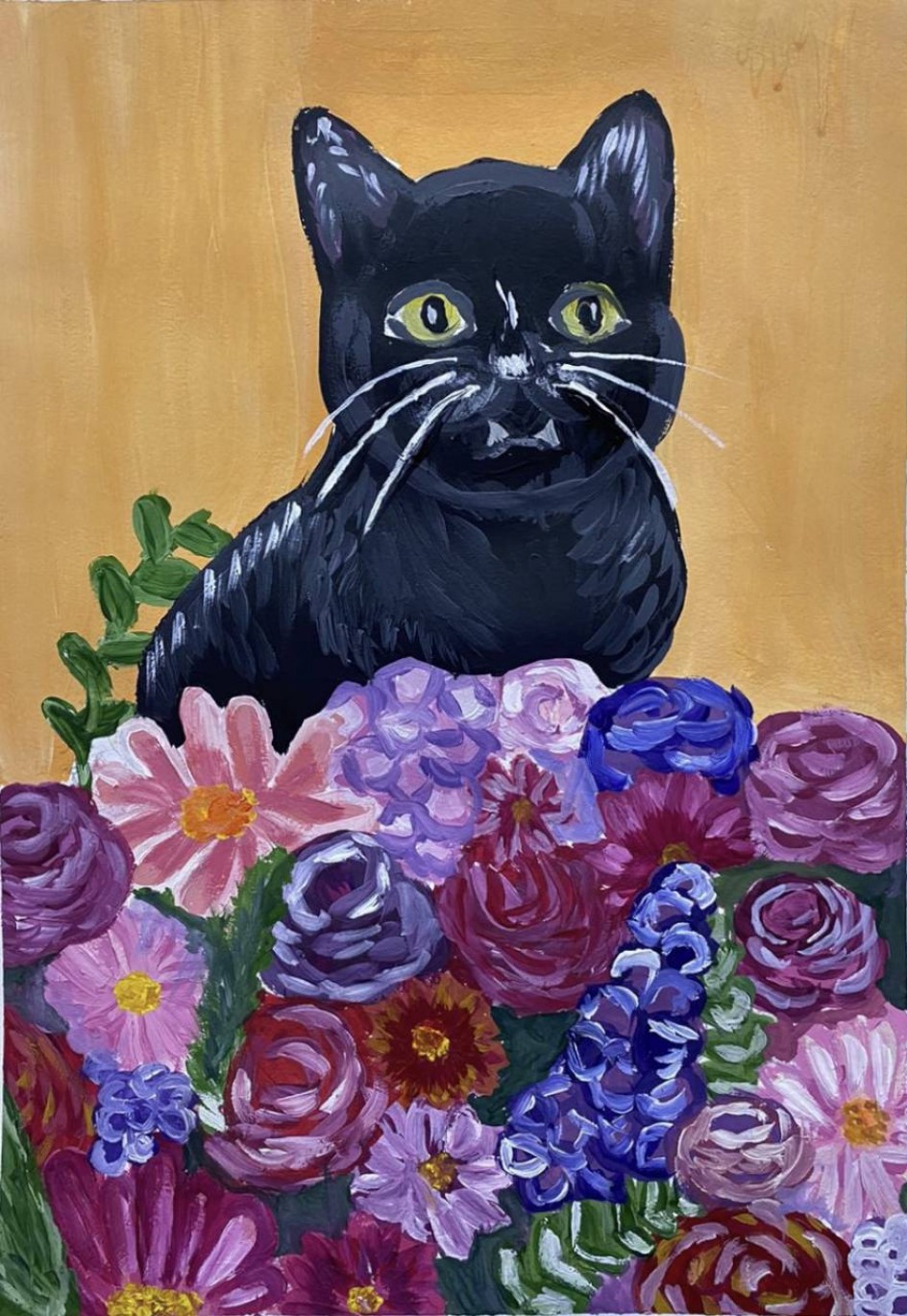 Котенок в цветах