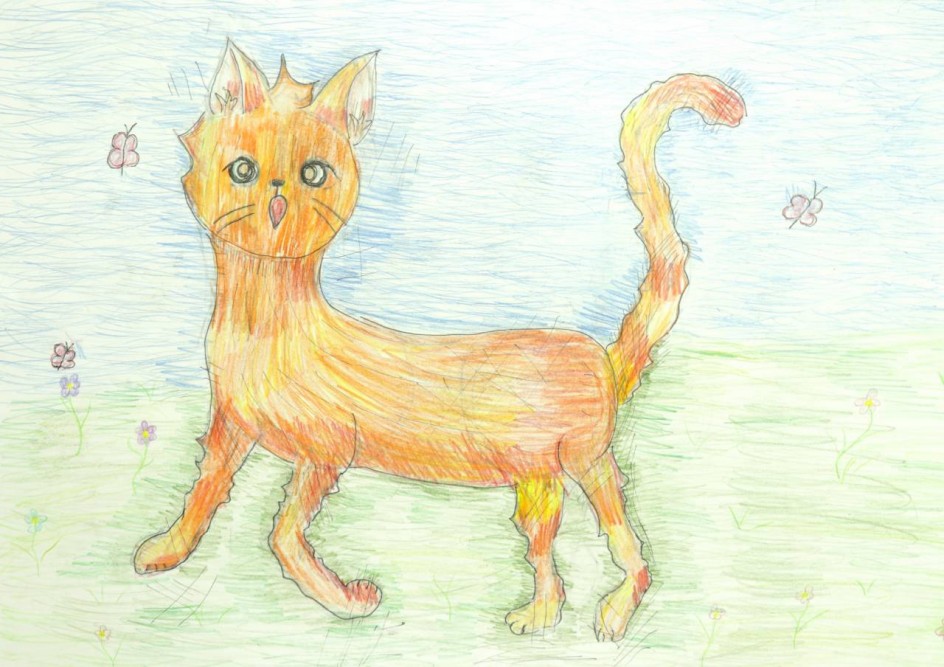 Кошка на лужайке