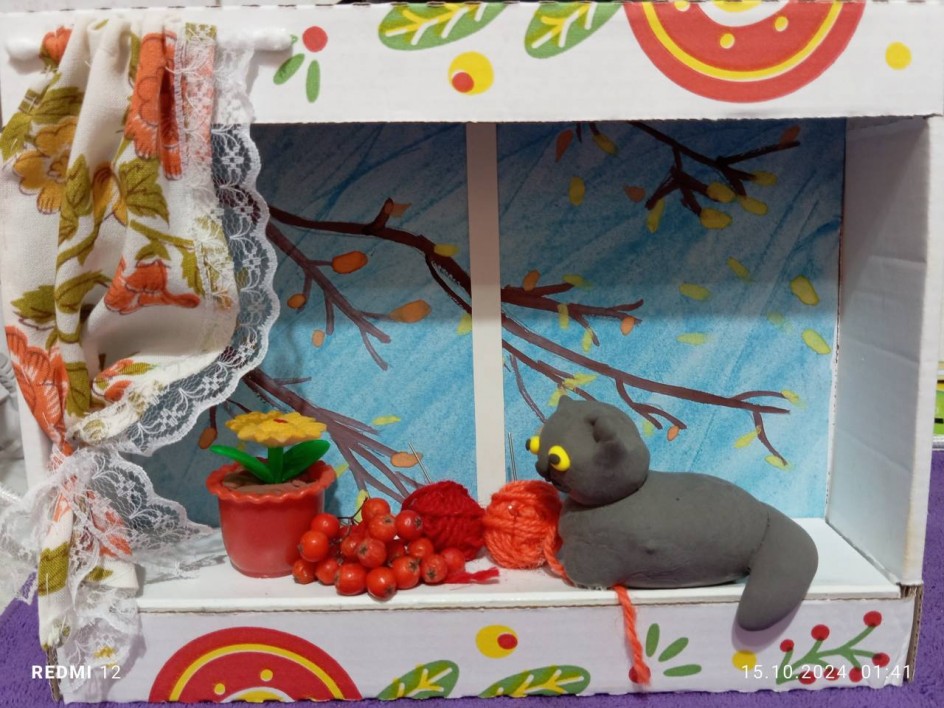 Кот на окошке