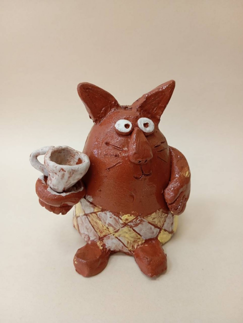 Кот осенью